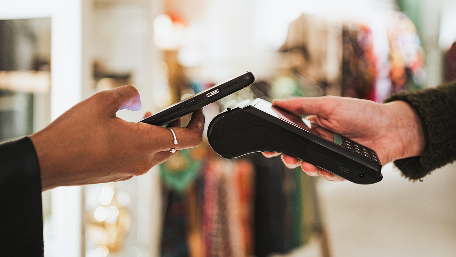 Using digital wallet tap to pay in-store.