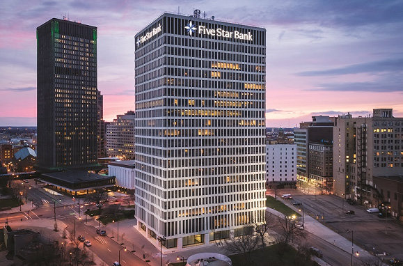 Five Star Bank Plaza in downtown Rochester at sunset.