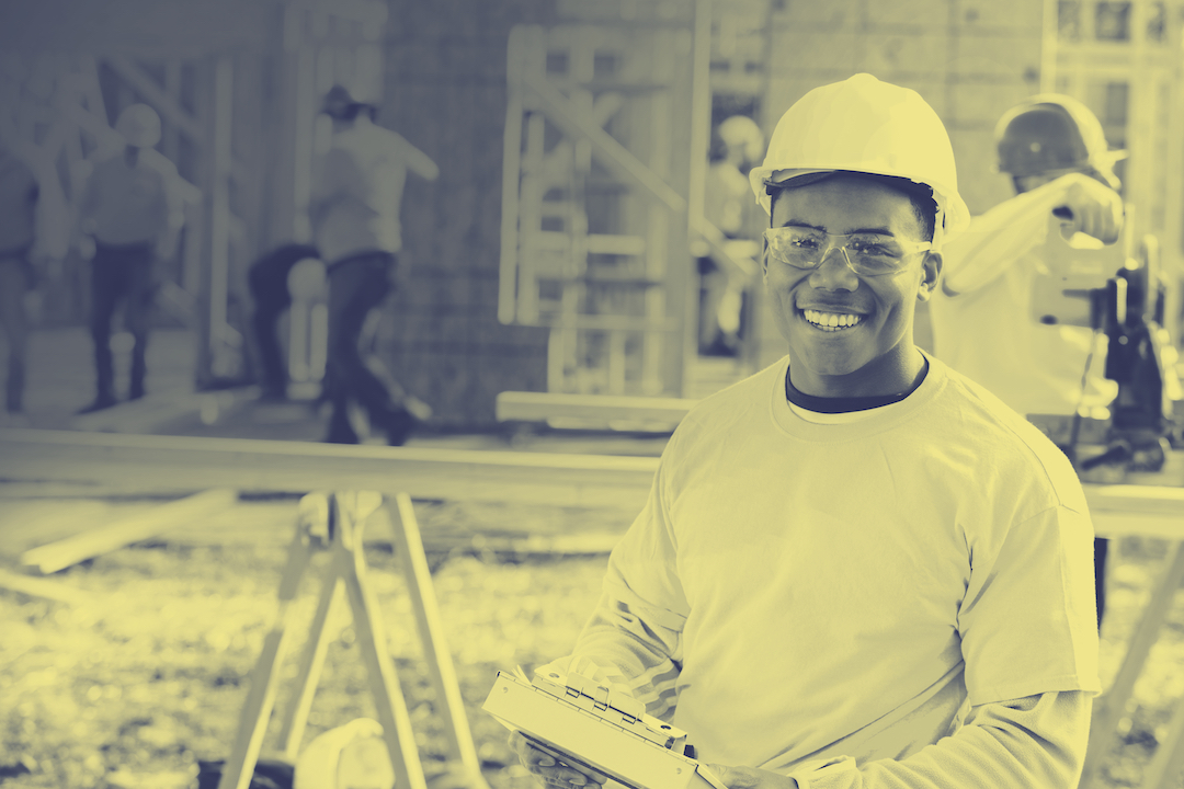 Male construction working on job site