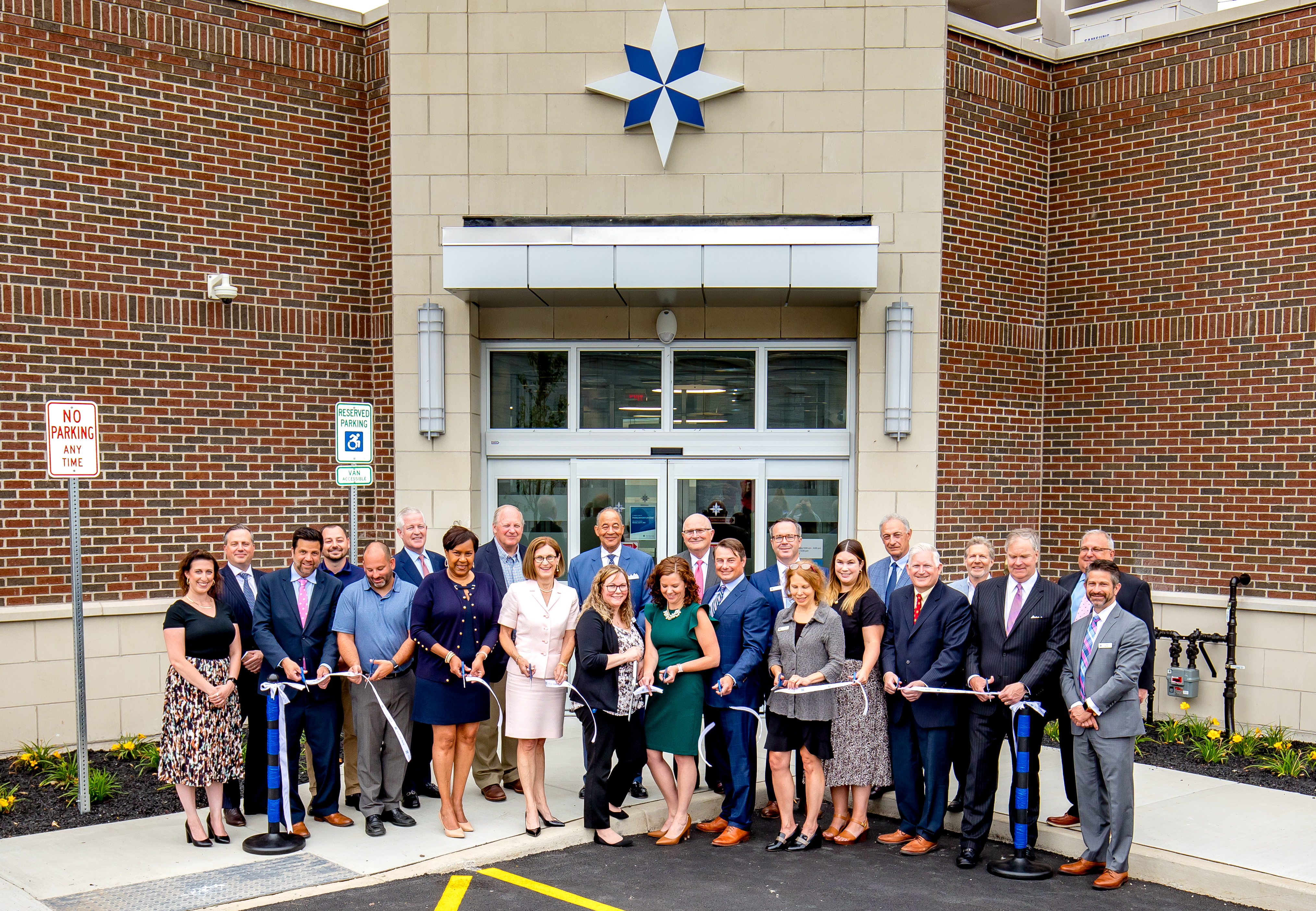 Five Star Bank team standing in front of Seneca Street Office