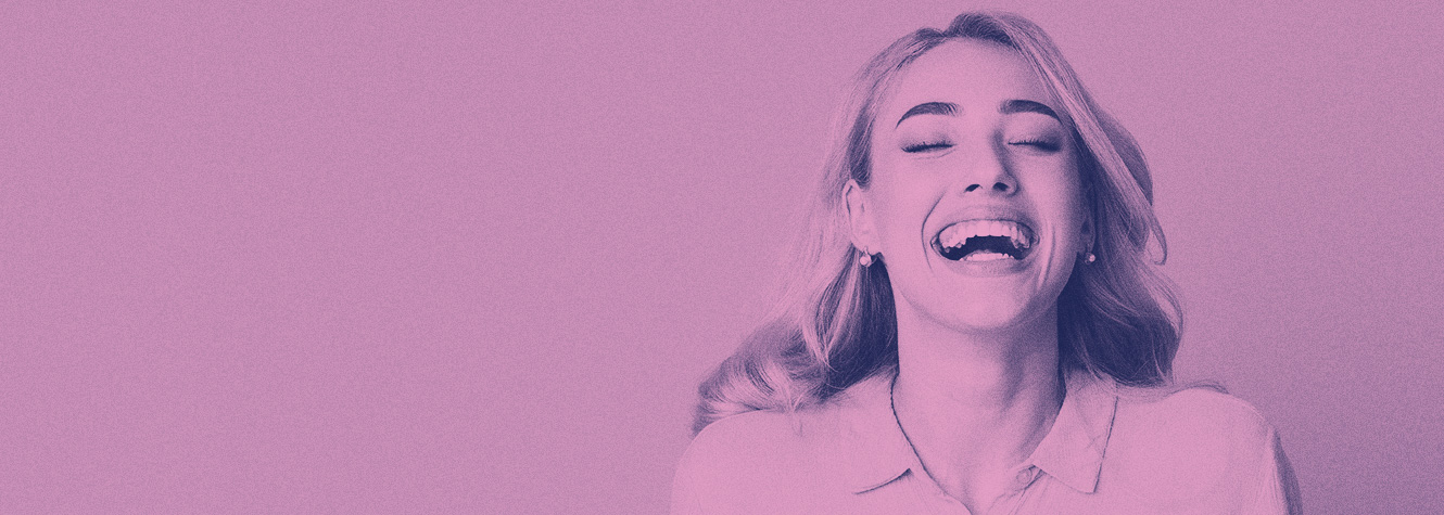 Woman laughing and smiling