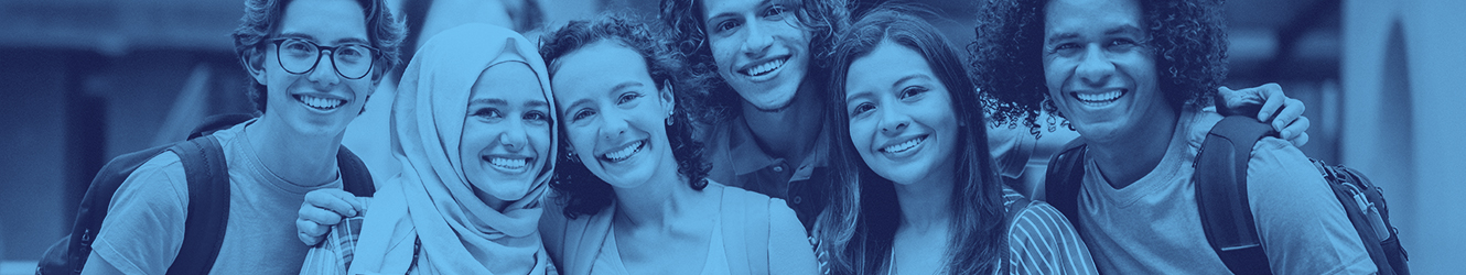 students smiling, posing for picture