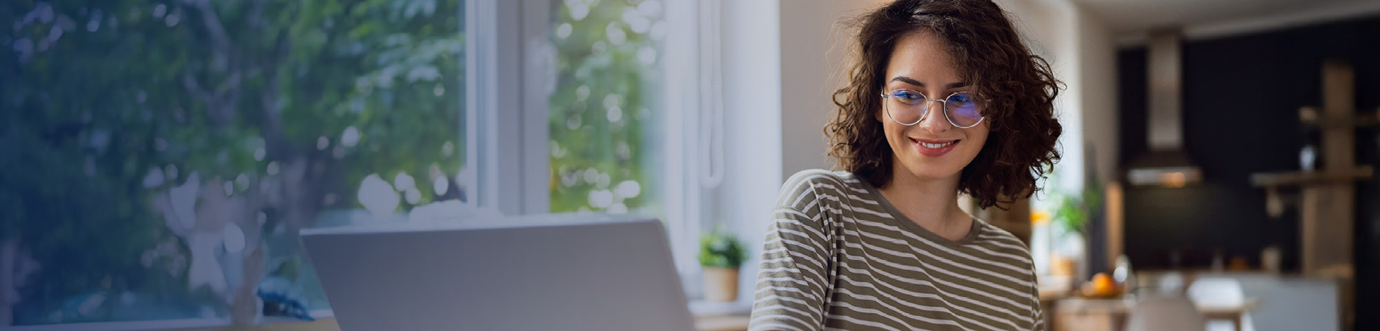Woman on a computer.