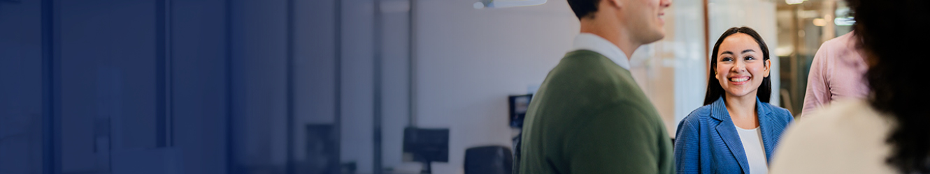 Student associate listening to group conversation.