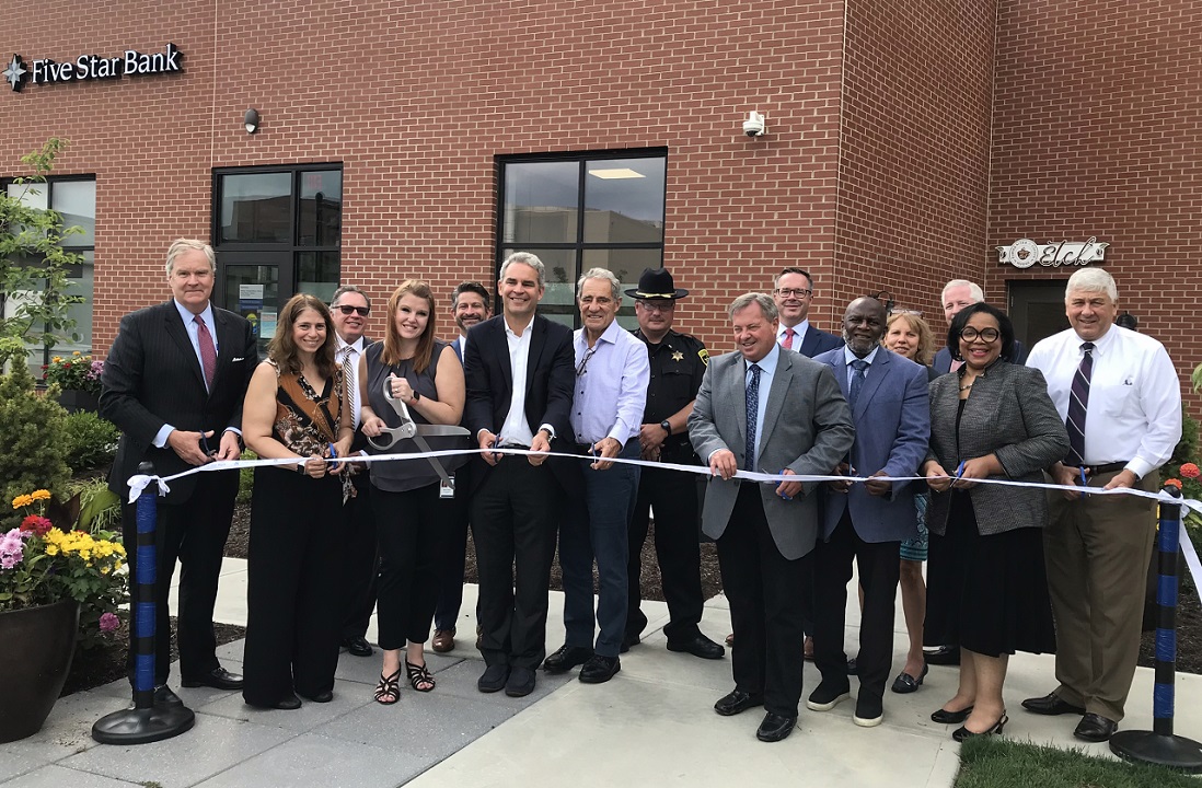 Community and Bank leaders cut the ribbon on the new branch in downtown Elmira.